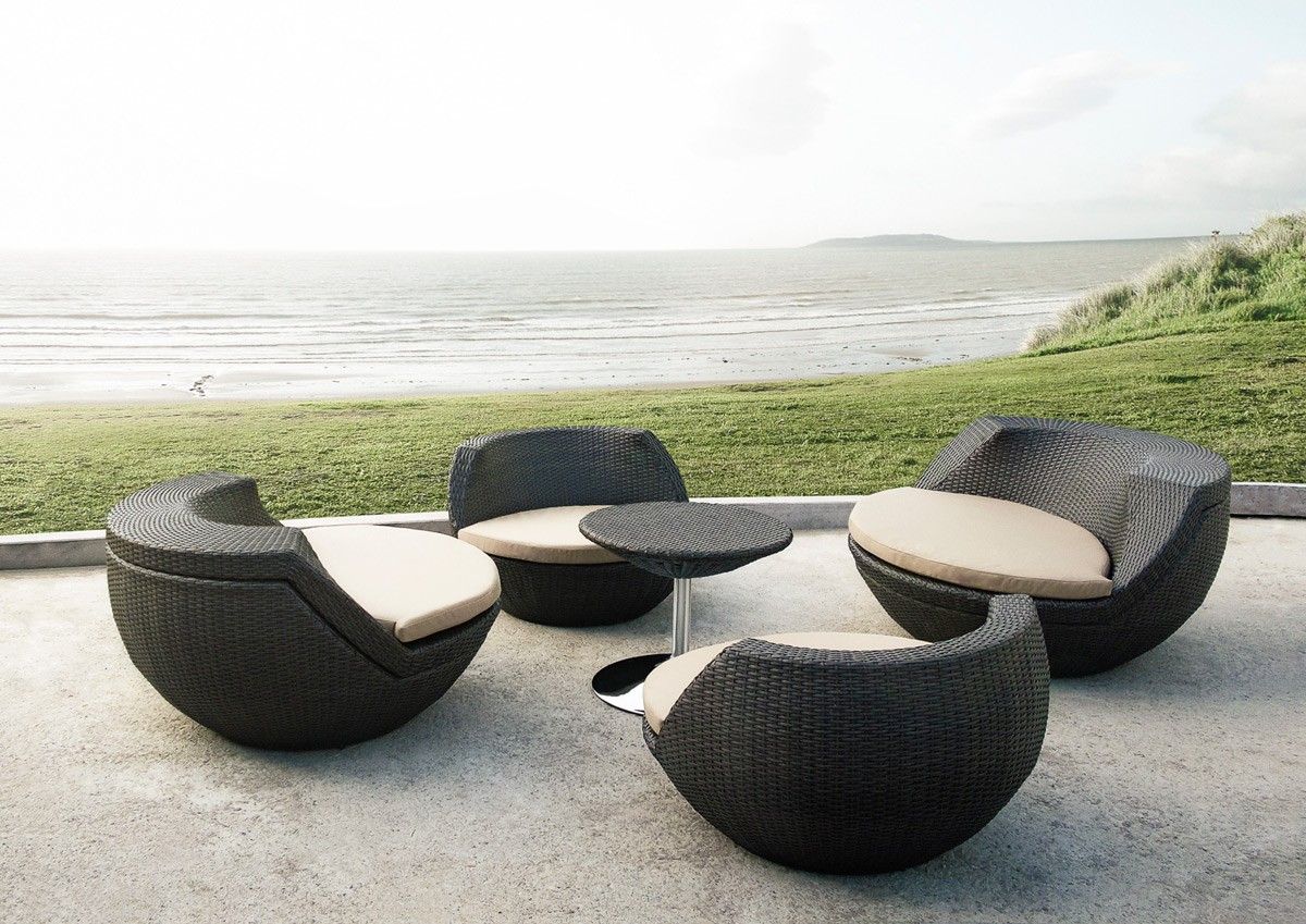 Outdoor rattan seating set overlooking the coast